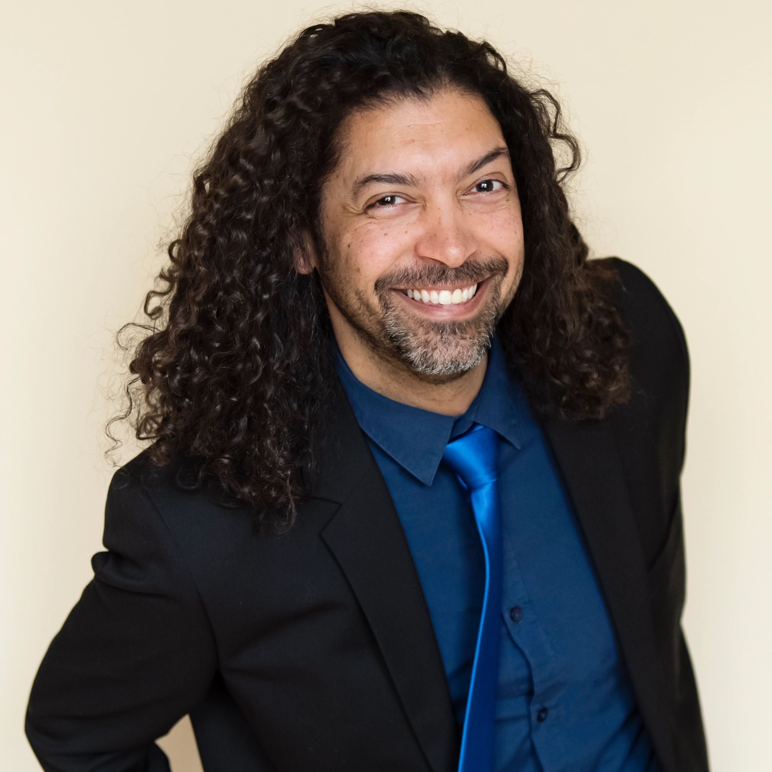 Professional headshot of a business manager